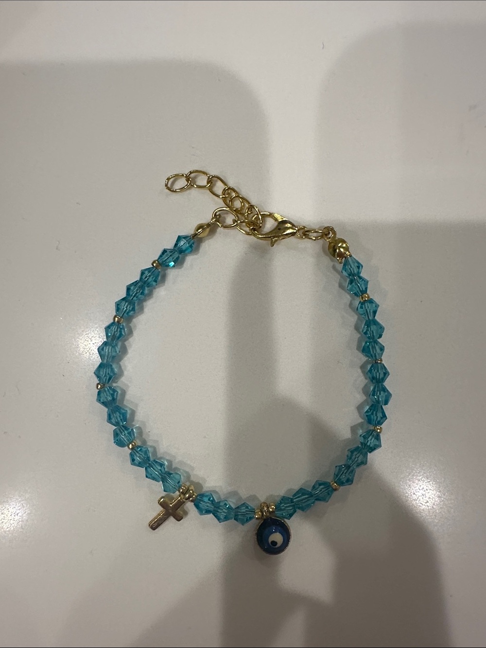 Aqua Crystal Bead Bracelet with Cross & Evil Eye Charm